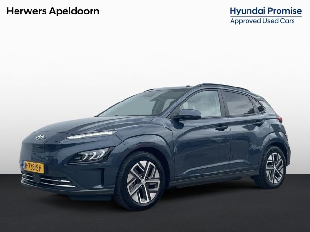 Hyundai Kona EV Premium Sky 64 kWh /Apple Carplay/Android Auto/ cruise control adaptief met Stop&Go/ elektrisch glazen schuif-/kanteldak/ metaalkleur (€ 695) V7U - Surfy Blue Metallic/