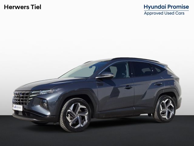 Hyundai Tucson 1.6 T-GDI PHEV Comfort Smart 4WD Automaat / Accu SoH 100% / Trekhaak / 1350KG Trekgewicht / Navigatie / Achteruitrijcamera / Apple Carplay Android Auto / Stuur- en Stoelverwarming / Adaptief cruise control / Dealer onderhouden /