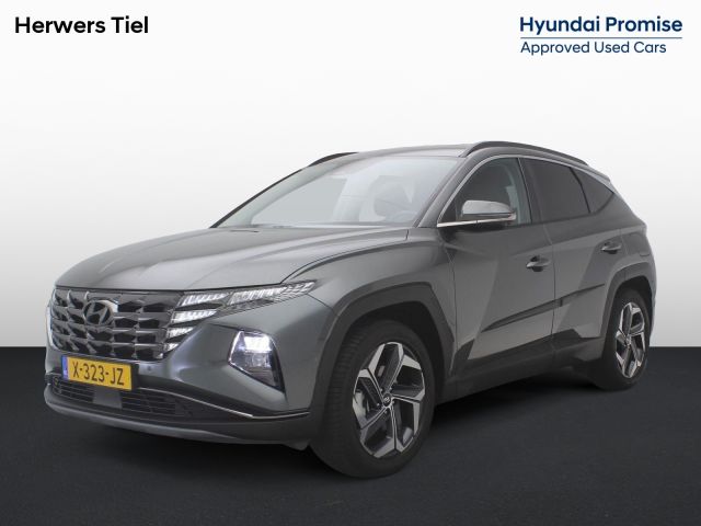 Hyundai Tucson 1.6 T-GDI PHEV Premium 4WD AUTOMAAT /Trekhaak / 1ste Eigenaar / NL auto / Dealer onderhouden / Navigatie / Lederen bekleding / Stoelverwarming Voor & Achter / Adaptieve Cruise Control /
