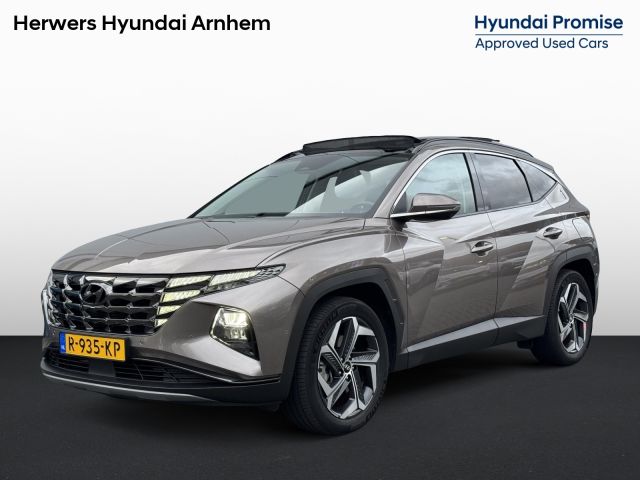 Hyundai Tucson 1.6 T-GDI HEV Premium Sky Eerste eigenaar/ Dealer onderhouden / Glazen schuif- en kanteldak / Trekgewicht 1650 Kg/ Trekhaak  / Elektrische achterklep / Adaptief cruise control / Stuur- en Stoelverwarming / Stoelventilatie /