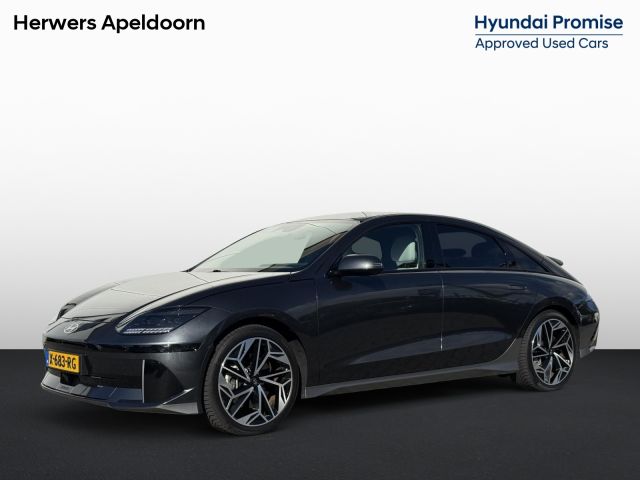 Hyundai IONIQ 6 Lounge 77.4 kWh / NL Auto / 10-2029 Fabrieksgarantie / SOH 100 % / Trekhaak afneembaar 1.500 kg / WLTP 545 km / Warmtepomp / Wit Leder / HUD / Camera 360° /