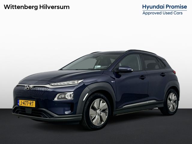 Hyundai Kona EV PREMIUM 64 kWh | 3- FASE | NAVI | CLIMA | CRUISE | CAMERA | HUD | LEDER | STUUR- & STOELVERWARMING | WARMTEPOMP | PRIVACY GLASS | WLTP 481 KM! |