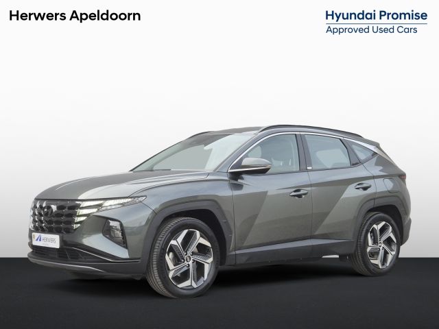 Hyundai Tucson 1.6 T-GDI PHEV Plug-in Comfort 4WD Automaat / Accu SOH 100% / Fabrieksgarantie tot 09-2026 / Trekgewicht 1350 kg / Dealer onderhouden / EAER bereik 62 km bereik stad 74 km / Apple Carplay Android Auto / Stoelverwarming / Cruise control /