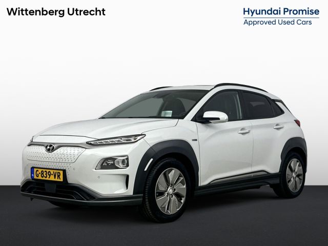 Hyundai Kona EV Premium 64 kWh | Adaptieve Cruise | Warmtepomp | Stoel stuur verwaming + verkoeling | Apple carplay & android auto | Climate control | Dodehoek detectie |