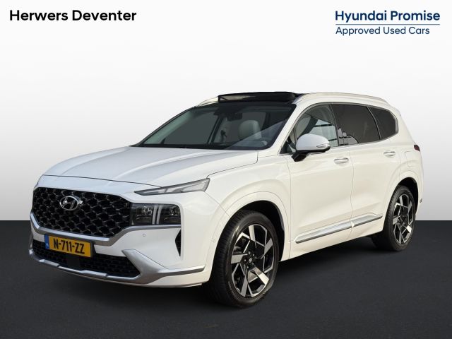Hyundai Santa Fe 1.6 T-GDI HEV Premium Plus Sky 5P / Navigatie / 1650 trekgewicht / Elektrische stoelverstelling met Geheugenfunctie / Achteruitrijcamera / Stoelverwarming / Schuif- Kantel dak /