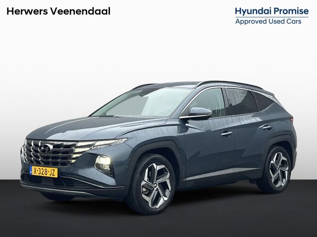 Hyundai Tucson 1.6 T-GDI PHEV Premium 4WD / Vaste Trekhaak 13-polig (Trekgewicht 1.350kg) / Stuur- en Stoelverwarming / Stoelverkoeling / Adaptieve Cruise Control / 360° Camera / Climate Control / Navigatie full map / Apple Carplay & Android Auto / Elektrisch Verstelbare Voorstoelen met geheugenset Bestuurdersstoel / Keyless Entry & Start / Elektrische Achterklep