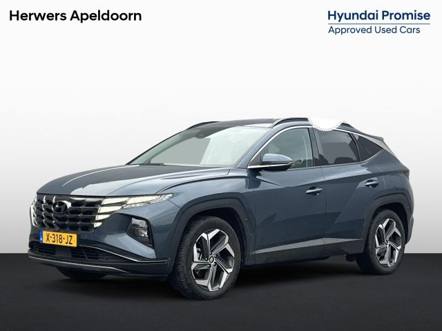 Hyundai Tucson 1.6 T-GDI PHEV Comfort Smart 4WD / Vaste Trekhaak 13-polig (Trekgewicht 1.350kg) / Achteruitrijcamera / Stuur- en Stoelverwarming / Climate Control /  Adaptieve Cruise Control / Apple Carplay & Android Auto / Keyless Entry & Start / Navigatie full map / Elektrische Achterklep