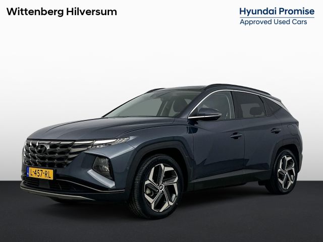 Hyundai Tucson 1.6 T-GDI PHEV PREMIUM SKY 4WD *| SCHUIFDAK | 360 CAMERA | NAVI | CLIMA | CRUISE | 19'' LM VELGEN | AFNEEMBARE TREKHAAK | STUUR- & STOELVERWARMING | ELEKTRISCHE ACHTERKLEP | APPLE CAR PLAY & ANDROID AUTO | LEDER | FABRIEKSGARANTIE GELDIG T/M 7-2026! |