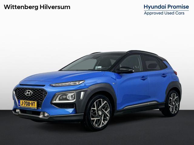 Hyundai Kona 1.6 GDI HEV PREMIUM | TWO TONE | TREKHAAK | ALL SEASONS | PRIVACY GLASS | 18'' LM VELGEN | LEDER | CLIMA | CRUISE | CAMERA | STUUR- & STOELVERWARMING | HYBRID | AUTOMAAT |