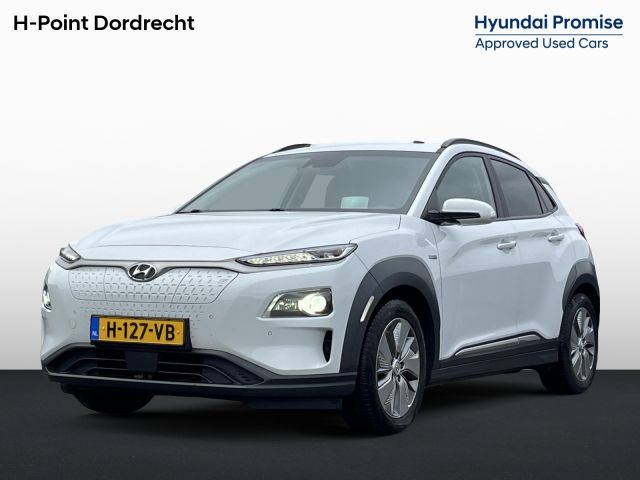 Hyundai Kona EV Premium 64 kWh | 3-Fase OBC | Schuifkanteldak | Lederen bekleding | Long Range Accu | Volledig dealer onderhouden | Allseason banden |