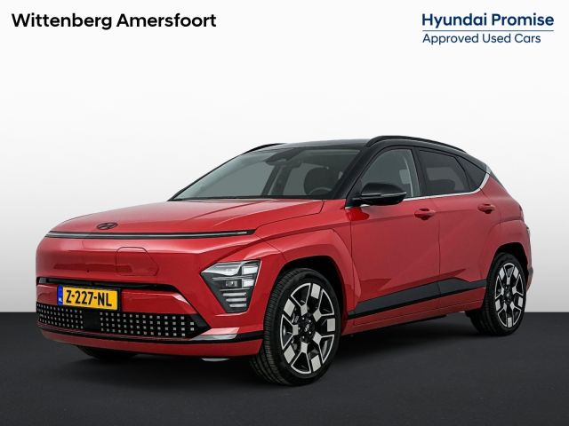 Hyundai Kona Electric Premium 65.4 kWh | Leer | Trekhaak | Stoel + stuurverwarming | Memory | 360 Camera |