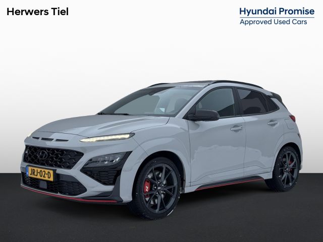 Hyundai Kona 2.0 T-GDI N Performance 280pk DCT8 / Cyber Grey / Fabrieksgarantie tot 04/2027 / Trekhaak / Schuifdak / Dealer Onderhouden / Limited Slip Diff / Adaptieve Cruise / Adaptieve Onderstel / Stoel & Stuurwielverwarming / Elektr. Stoelen / Stoelventilatie / Navigatie / Camera / Dodehoek Detectie /