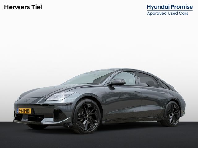 Hyundai IONIQ 6 First Edition AWD 77.4 kWh / SoH 100% / Warmtepomp / V2L / Schuif-kanteldak /  360 Camera / HUD Dsiplay / Automatische Flush handgrepen / Airco / Stoel verwarming  / Stuurverwarming / Full Option /