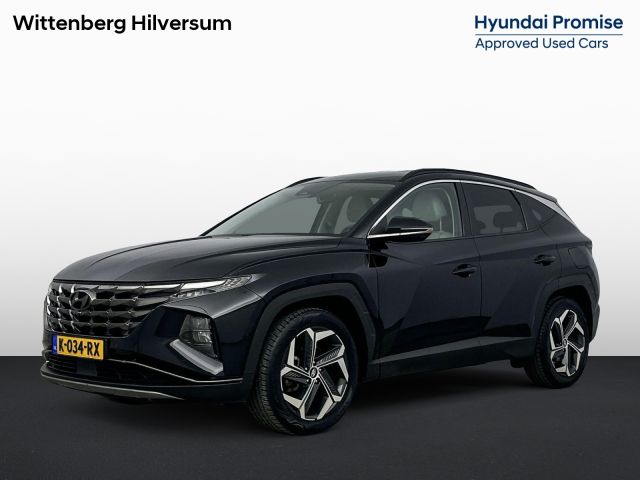 Hyundai Tucson 1.6 T-GDI HEV PREMIUM | CHIQUE IVOOR LEDER | CLIMA | CRUISE | 360 CAMERA | NAVI | 19'' LM VELGEN | STOEL- & STUURVERWARMING | PRIVACY GLASS |