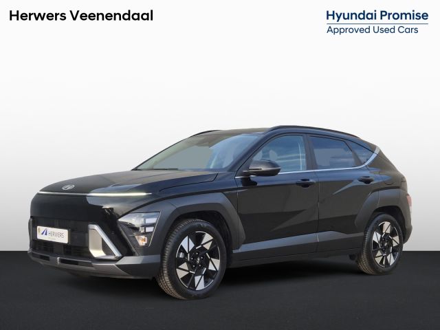 Hyundai Kona 1.6 GDI HEV Comfort Smart Automaat / Fabrieksgarantie tot 2-2030 / Stuur- & Stoel verwarming / Achteruitrijcamera / Apple Carplay Android Auto / Keyless Entry/Start / Adaptief cruise control / Draadloze telefoon lader / Climate control /