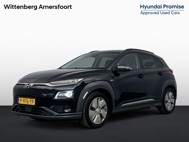 Hyundai Kona EV Comfort Smart 64 kWh | SoH 96% | Stoel + stuurverwarming | All Season banden | LED | Privacy glass |