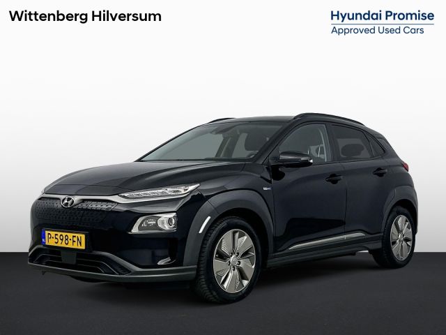 Hyundai Kona EV COMFORT SMART 64 kWh | NAVI | WARMTEPOMP | 3 FASEN | STOEL & STUURVERWARMING | CLIMA | CRUISE | CAMERA | NAVI via APPLE CARPLAY & ANDROID AUTO |