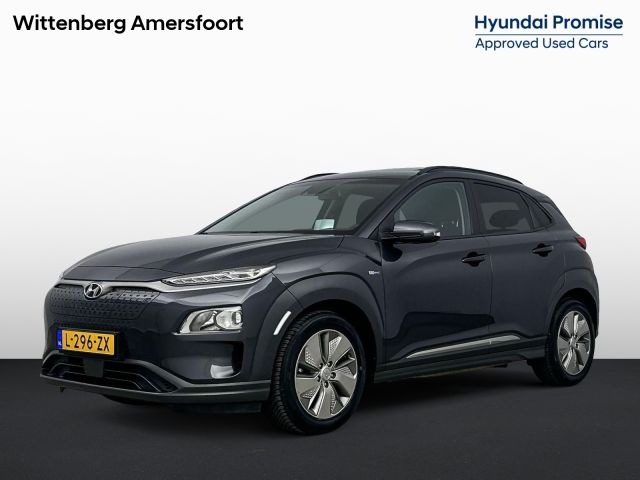 Hyundai Kona EV Fashion Sky 64 kWh | Schuifdak | All Season | Warmtepomp | Navigatie | Camera | Head-up display |