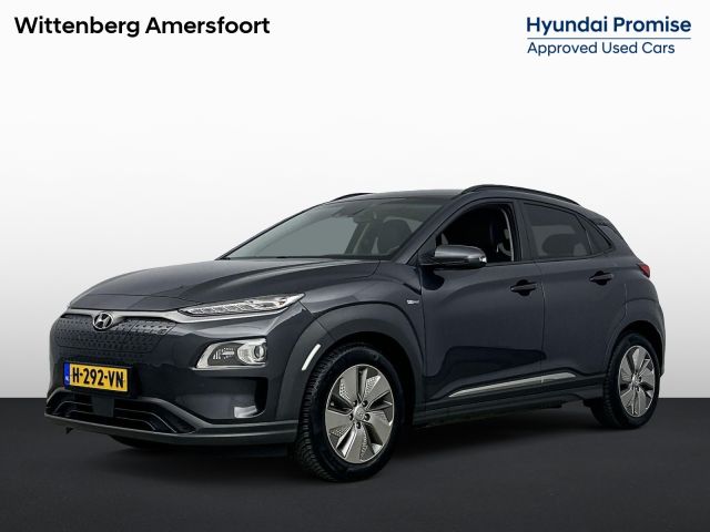 Hyundai Kona EV Premium 64 kWh | SoH 96% | Leer | Stoel + stuurverwarming | Head-up display | Navigatie | Camera |