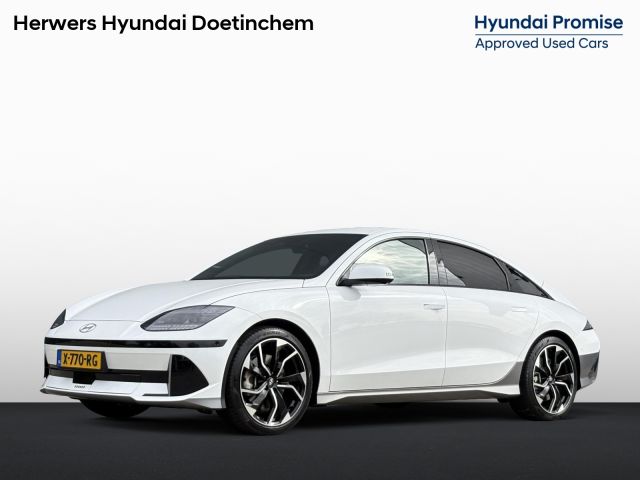 Hyundai IONIQ 6 Lounge 77.4 kWh / SOH 100% / Origineel NL Auto / 02-2030 Fabrieksgarantie / Stoel-, Stuur en Achterbankverwarming / Elektrische Stoelen / Stoelgeheugen / 360 Camera / Warmtepomp / Dodehoek Camera / HUD Display / Full Option /