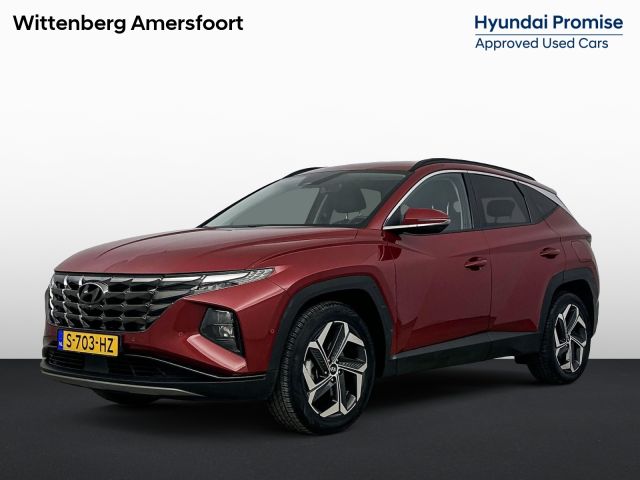 Hyundai Tucson 1.6 T-GDI HEV Premium | Leer | Trekhaak | Trekgewicht 1650kg | Memory | Stoel + stuurverwarming |