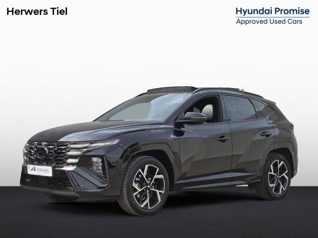Hyundai Tucson 1.6 T-GDI HEV 215 pk N Line Sky / Facelift / Fabrieksgarantie tot 06-2029 / Dealer onderhouden / Panorama schuifdak / Navigatie / Camera 360° / Elektrische stoelen & klep / Stuur-, stoel- en achterbankverwarming / Apple Carplay Android / 19" LM wielen /
