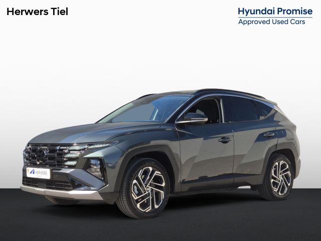 Hyundai Tucson 1.6 T-GDI PHEV Comfort Smart / Facelift Model / Head Up Display  / Trekgewicht 1210 kg / Elektrische achterklep / Stuur- & Stoelverwarming / Achteruitrijcamera / Adaptief cruise control / EAER bereik 68 km bereik stad 87 km / Draadloze telefoon lader / Keyless Entry/Start /