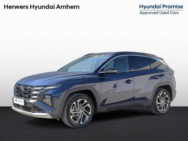 Hyundai Tucson 1.6 T-GDI HEV 215pk Facelift Comfort Smart / Fabrieksgarantie tot 7-2029 / HUD / Navigatie / Adpatieve Cruise / Camera / Stoel Verwarming / Stuurwiel Verwarming / DAB / Elektr. Achterklep /