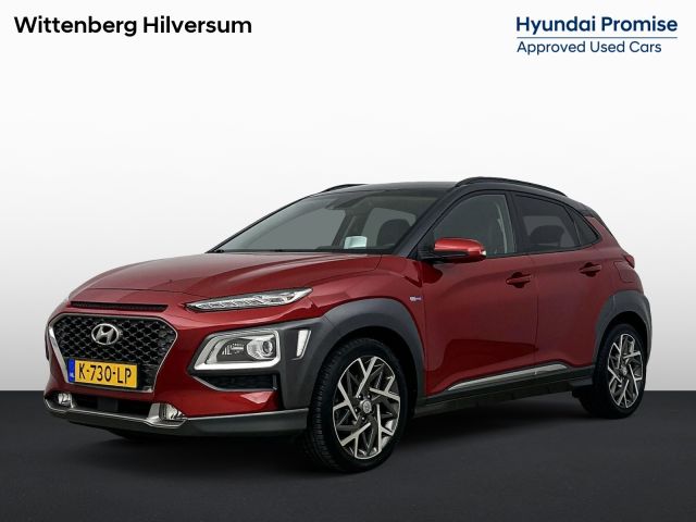 Hyundai Kona 1.6 GDI HEV PREMIUM | TWO TONE | TREKHAAK | LEDER | NAVI | CLIMA | CRUISE ADAPT. | CAMERA | 18'' LM VELGEN | M+S BANDEN | APPLE CAR PLAY & ANDROID AUTO | STOEL- & STUURVERWARMING |