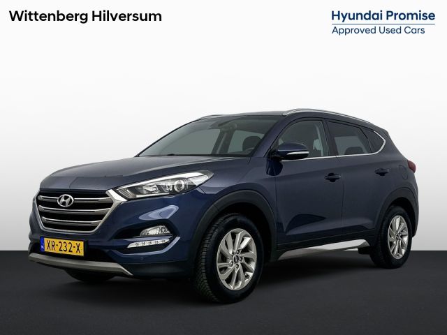 Hyundai Tucson 1.6 GDi COMFORT | ALL SEASONS | NAVI | CLIMA | CRUISE | CAMERA | 17'' LM VELGEN | STOELVERWARMING | PDC | LAGE KMSTAND! |