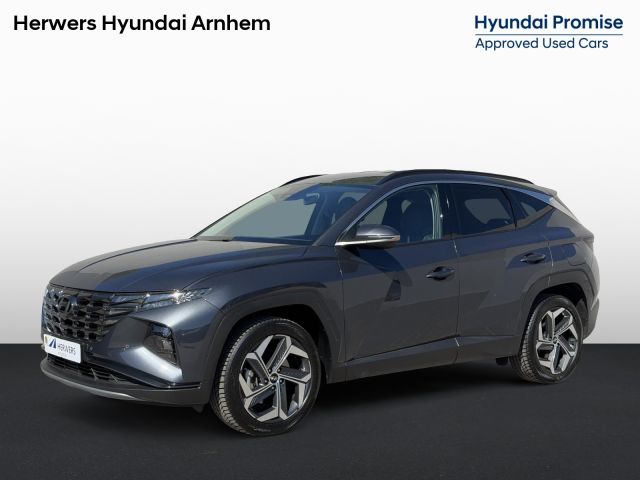 Hyundai Tucson 1.6 T-GDI HEV Comfort / Fabrieksgarantie tot 4-2028 / 1650 KG Trekvermogen / 8 jaar hybride batterij garantie / Navigatie / Elektr. Stoelen / Stoelverwarming / Lederen Bekleding / Camera / Krell Audio / Apple Carplay & Android Auto /