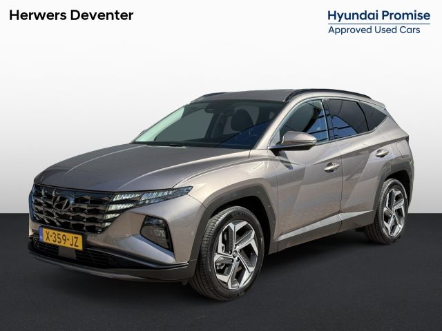 Hyundai Tucson 1.6 T-GDI HEV Premium / 1ste Eigenaar / Elektrische Stoelen met Geheugen / Elektrische Achterklep / Stoel Verwarming+Verkoeling / Apple Carplay&Android Auto / 360º Camera / Stuur Verwarming / Lederen Bekleding /