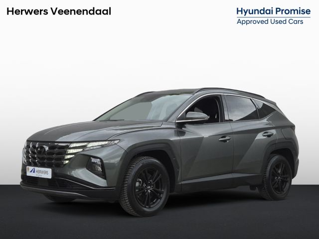 Hyundai Tucson 1.6 T-GDI HEV Comfort Smart / Fabrieksgarantie tot 03-2027 / Dealer onderhouden / Trekhaak afneembaar / Navigatie/ Apple Carplay Android / Stuur- & Stoel verwarming / Elektrische achterklep / Achteruitrijcamera /