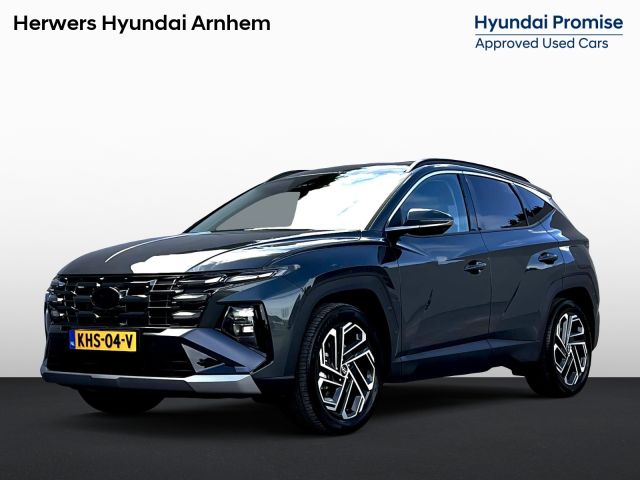 Hyundai Tucson 1.6 T-GDI HEV Premium / Fabrieksgarantie tot 09-2029 / Dealer onderhouden / 1.360 kg Afn. trekhaak / Leder / Elektrische stoelen en klep / Stuur-, stoel- en achterbankverwarming / Stoelventilatie / Camera 360° /