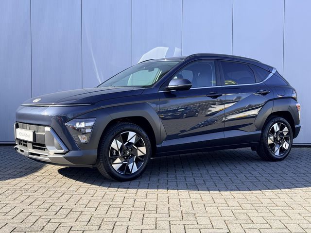 Hyundai Kona 1.6 GDI HEV Comfort Smart / Fabrieksgarantie tot 1-2030 / Stuur- & Stoelverwarming / Adaptief cruise control / Achteruitrijcamera / Climate control / Keyless Entry/Start / Apple Carplay Android Auto / Navigatie / Parkeersensoren voor en achter /