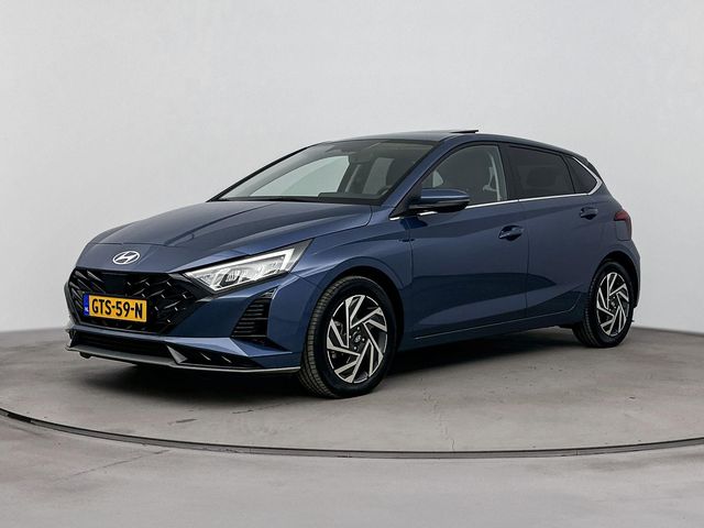 Hyundai i20 1.0 T-GDI PREMIUM SKY | OPEN DAK | NAVI | CAMERA | STOEL- & STUURVERWARMING | CRUISE | CLIMA | DODHOEK DETECTIE | 16'' LM VELGEN | FABREIKSGARANTIE GELDIG T/M 11-2029! |