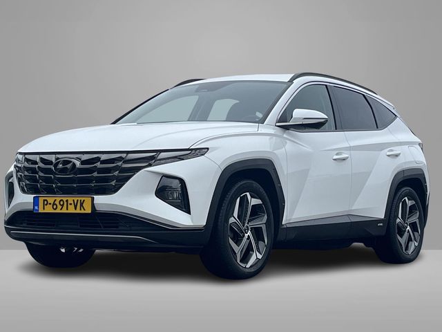 Hyundai Tucson Comfort 1.6 T-GDI PHEV 265pk 4WD | LAGE KM-STAND! | NAVI | 19'' BI-COLOR LM-VELGEN | 4WD |