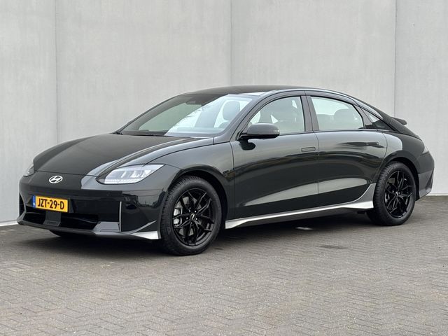 Hyundai IONIQ 6 Connect 77.4 kWh / SOH 100%/ Warmtepomp / CCS snellader / Fabrieksgarantie tot 1-2030 / 8 Jaar Batterij Garantie / Camera / 1.500 KG Trekgewicht / Adaptieve Cruise / Stoel, Stuur & achterbank Verwarming / Apple carplay/Android auto /