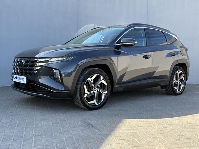 Hyundai Tucson 1.6 T-GDI HEV 230 Premium Automaat / Dealer onderhouden / Afneembare Trekhaak (1.650KG) / Leder / Elektrische stoelen/klep / Stoelventilatie / Stuur-, stoel- & achterbankverwarming / Apple CarplayAndroid Auto / 19” LM wielen /