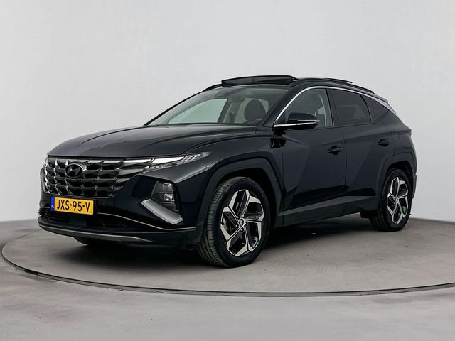 Hyundai Tucson 1.6 T-GDI HEV PREMIUM SKY *| TREKHAAK | SCHUIF KANTEL DAK | NAVI | LEDER | CLIMA | CRUISE ADAPT. | 360 CAMERA | 19'' LM VELGEN | ELEKTRISCHE ACHTERKLEP | STOEL - & STUURVERWARMING | LAGE KMSTAND! |