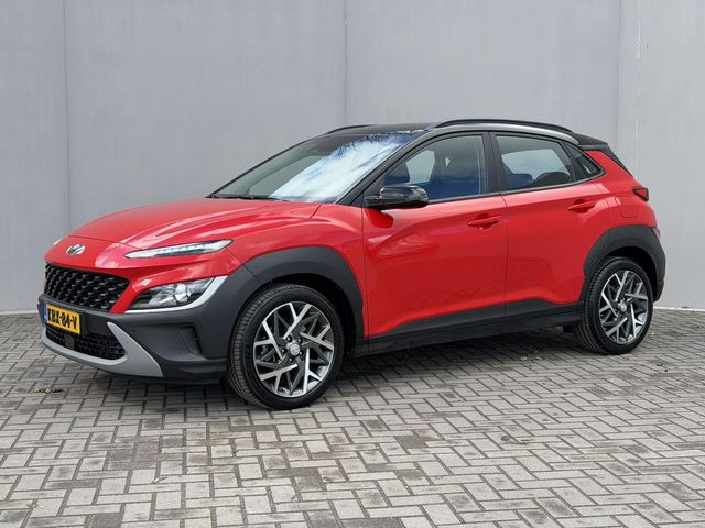 Hyundai Kona 1.6 GDI HEV Fashion Automaat / Fabrieksgarantie tot 10-2027 / Dealer Onderhouden / Adaptieve Cruise / Stuur & Stoelverwarming / Camera / Navigatie / Dodehoek Detectie / Apple Carplay & Android Auto / 18” LM wielen Premium / DAB /
