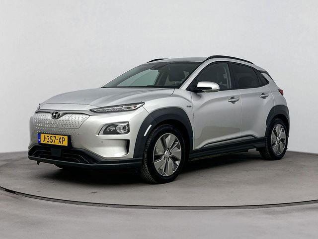 Hyundai Kona EV Premium 64 kWh | Soh 96.2% | Leder | Navigatie & carplay | adap cruise | elektrisch verstelbare stoel |