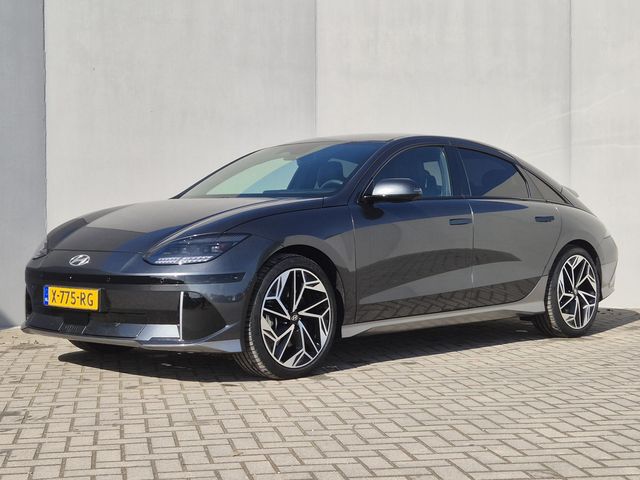 Hyundai IONIQ 6 Lounge AWD 77.4 kWh 325pk Automaat / Accu SOH 100% / Fabrieksgarantie tot 03-2029 / Trekgewicht 1.500 kg / warmtepomp / CCS snellader / Rondomzicht camera / Head Up Display / Bose Audio Systeem / Stuur- en Stoelverwarming / Elektrische achterklep / Adaptief cruise control /