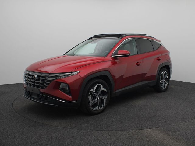 Hyundai Tucson 1.6 T-GDI PHEV Premium Sky 4WD | 360 graden camera | Stoelverwarming en stoelverkoeling | Schuif/ kantel dak | Draadloze telefoon oplader |