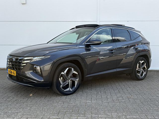 Hyundai Tucson 1.6 T-GDI HEV Premium Sky / Achterbank verwarmd / Airco (automatisch) / Cruise control adaptief met Stop&Go /