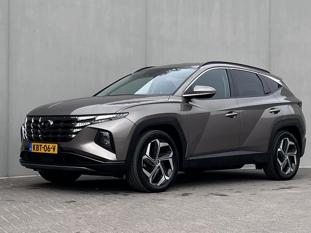 Hyundai Tucson 1.6 T-GDI PHEV Comfort Smart 4WD Automaat / Dealer onderhouden / 1e eigenaar / Afneembare trekhaak 1.350 kg / Stuur- en stoelverwarming / Navigatie / Apple Carplay Android / 19”  LM wielen /