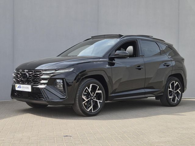 Hyundai Tucson 1.6 T-GDI HEV 215 pk N Line Sky / Facelift / Fabrieksgarantie tot 06-2029 / Dealer onderhouden / Panorama schuifdak / Navigatie / Camera 360° / Elektrische stoelen & klep / Stuur-, stoel- en achterbankverwarming / Apple Carplay Android / 19" LM wielen /